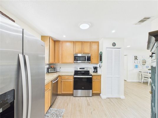 Interior, Kitchen, Recessed Lighting, Stainless Steel Appliances, Wood Texture Flooring
