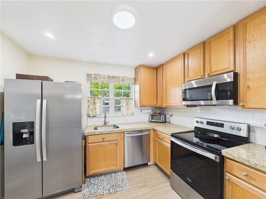 Interior, Kitchen, Recessed Lighting, Stainless Steel Appliances, Wood Texture Flooring