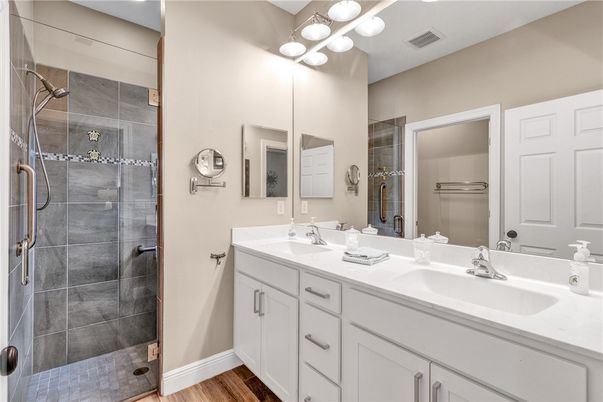 Bathroom, Dual Sink Vanities, Glass Shower, Interior, Wood Texture Flooring