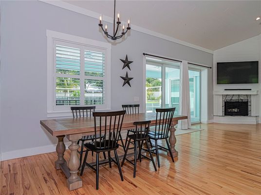 Chandelier, Dining room, Fireplace, Interior, Recessed Lighting, Wood Texture Flooring