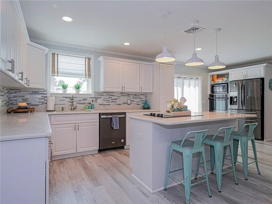Interior, Kitchen, Pendant Lights, Recessed Lighting, Stainless Steel Appliances, Wood Texture Flooring
