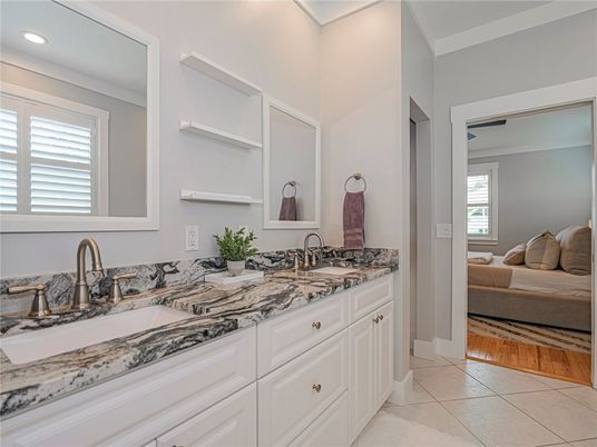 Bathroom, Dual Sink Vanities, Interior, Recessed Lighting, Wood Texture Flooring