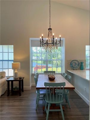 Chandelier, Dining room, Interior, Wood Texture Flooring