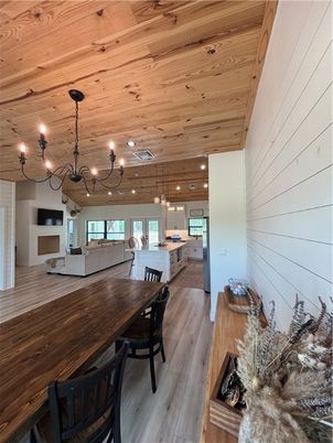 Chandelier, Dining room, Interior, Kitchen, Living room, Pendant Lights, Wooden Ceilings, Wood Texture Flooring