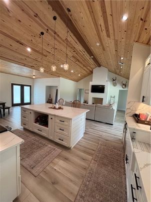 Fireplace, Interior, Kitchen, Living room, Pendant Lights, Recessed Lighting, Wooden Ceilings, Wood Texture Flooring