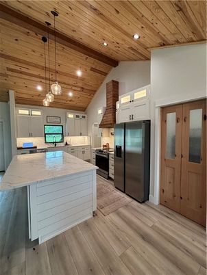 Interior, Kitchen, Pendant Lights, Recessed Lighting, Stainless Steel Appliances, Wooden Ceilings, Wood Texture Flooring