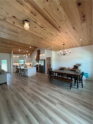 Chandelier, Dining room, Interior, Kitchen, Pendant Lights, Recessed Lighting, Wooden Ceilings, Wood Texture Flooring