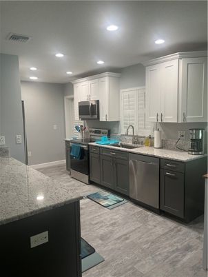 Interior, Kitchen, Recessed Lighting, Stainless Steel Appliances, Wood Texture Flooring