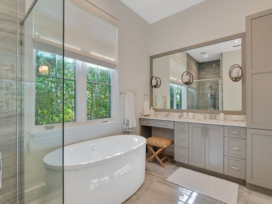 Bathroom, Dual Sink Vanities, Free Standing Baths, Glass Shower, Interior, Recessed Lighting, Wood Texture Flooring
