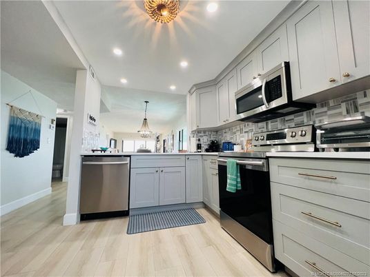 Interior, Kitchen, Pendant Lights, Recessed Lighting, Stainless Steel Appliances, Wood Texture Flooring