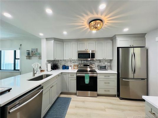 Interior, Kitchen, Recessed Lighting, Stainless Steel Appliances, Wood Texture Flooring