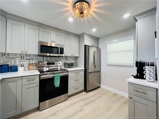 Interior, Kitchen, Recessed Lighting, Stainless Steel Appliances, Wood Texture Flooring