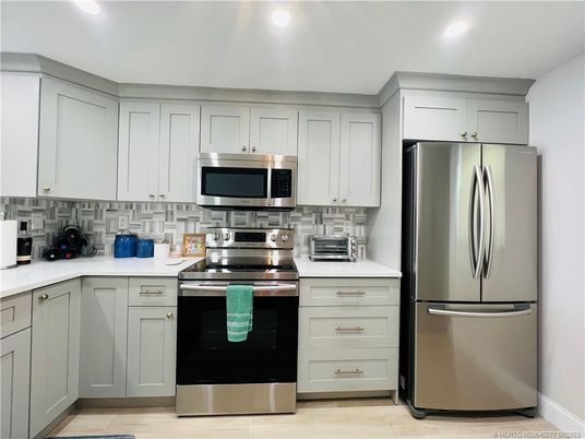 Interior, Kitchen, Recessed Lighting, Stainless Steel Appliances, Wood Texture Flooring