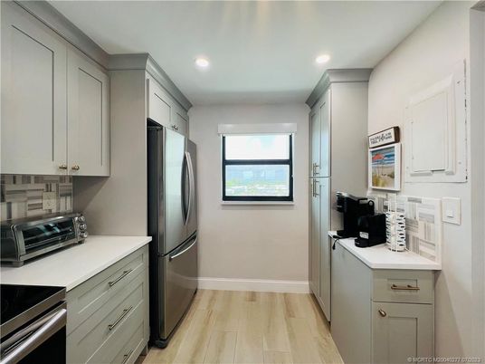 Interior, Kitchen, Recessed Lighting, Stainless Steel Appliances, Wood Texture Flooring