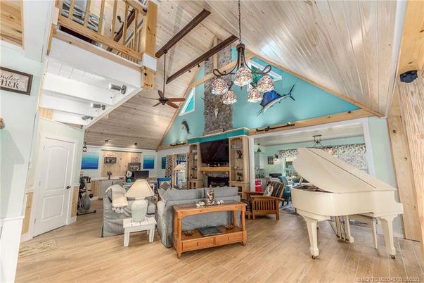 Dining room, Fireplace, Interior, Living room, Pendant Lights, Piano, Wooden Beams, Wooden Ceilings, Wood Texture Flooring, Wooden Walls