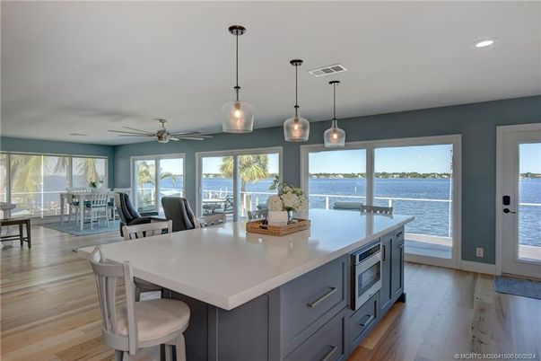 Dining room, Interior, Kitchen, Pendant Lights, Recessed Lighting, Water, Wood Texture Flooring