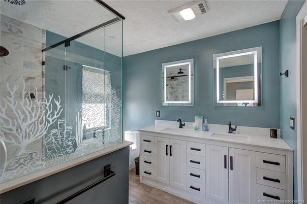 Bathroom, Dual Sink Vanities, Glass Shower, Interior, Wood Texture Flooring