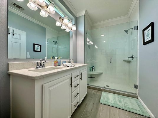 Bathroom, Dual Sink Vanities, Glass Shower, Interior, Wood Texture Flooring