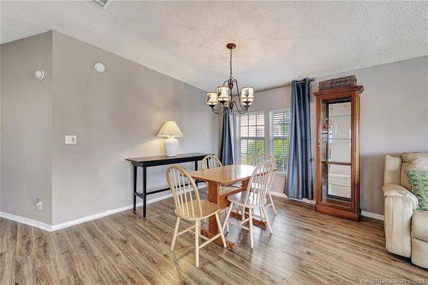 Chandelier, Dining room, Interior, Wood Texture Flooring