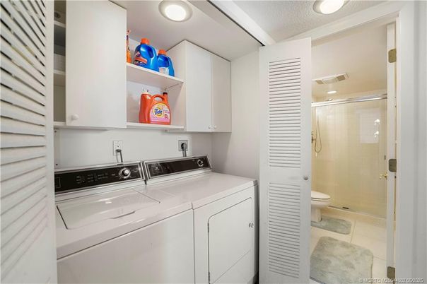 Bathroom, Glass Shower, Interior, Recessed Lighting, Utility Closets, Washer