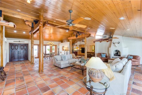 Chandelier, Dining room, Fireplace, Interior, Living room, Recessed Lighting, Wooden Ceilings