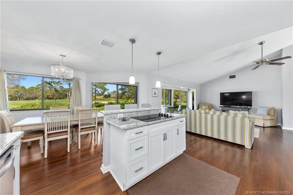Chandelier, Dining room, Interior, Kitchen, Living room, Pendant Lights, Wood Texture Flooring