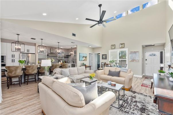 Dining room, Interior, Kitchen, Living room, Pendant Lights, Recessed Lighting, Stainless Steel Appliances, Wood Texture Flooring