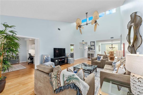 Chandelier, Dining room, Fireplace, Interior, Living room, Pendant Lights, Wood Texture Flooring