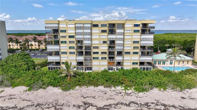 Exterior, Facade, Pool, Water, Condo Building
