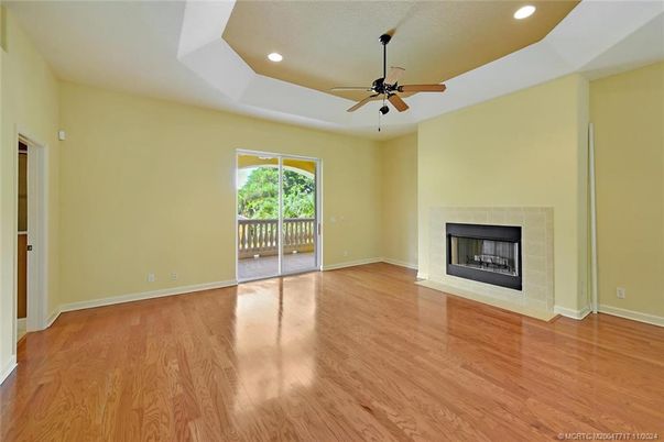 Empty room, Fireplace, Interior, Recessed Lighting, Wood Texture Flooring
