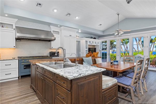 Dining room, Interior, Kitchen, Recessed Lighting, Stainless Steel Appliances, Wood Texture Flooring