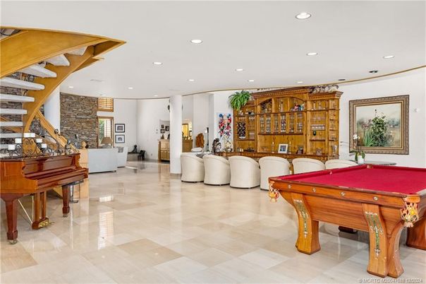Billiard Table, Fireplace, Game Room, Interior, Living room, Piano, Recessed Lighting, Stone Walls