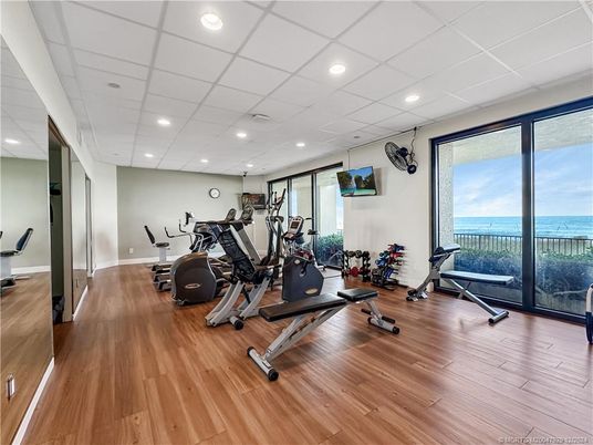 Fitness Equipment, Gym, Interior, Recessed Lighting, Water, Wood Texture Flooring
