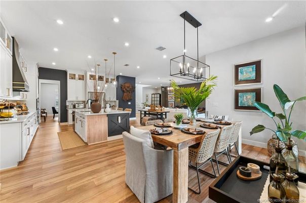 Dining room, Interior, Kitchen, Pendant Lights, Recessed Lighting, Stainless Steel Appliances, Wood Texture Flooring