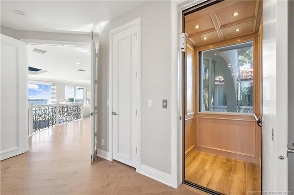 Elevator, Interior, Recessed Lighting, Wooden Ceilings, Wood Texture Flooring, Wooden Walls