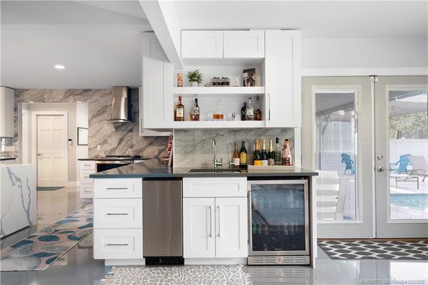 Interior, Kitchen, Marble Walls, Recessed Lighting, Stainless Steel Appliances