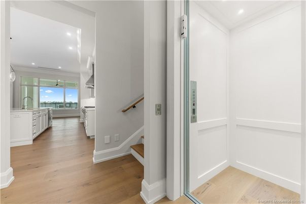 Elevator, Interior, Recessed Lighting, Wood Texture Flooring