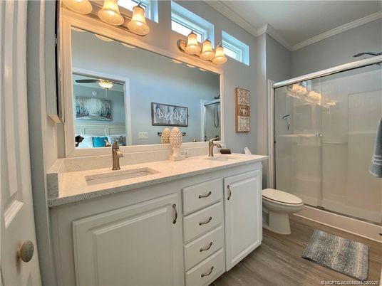Bathroom, Dual Sink Vanities, Glass Shower, Interior, Wood Texture Flooring