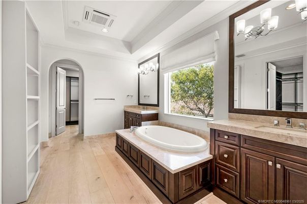 Bathroom, Dual Sink Vanities, Interior, Recessed Lighting, Wood Texture Flooring