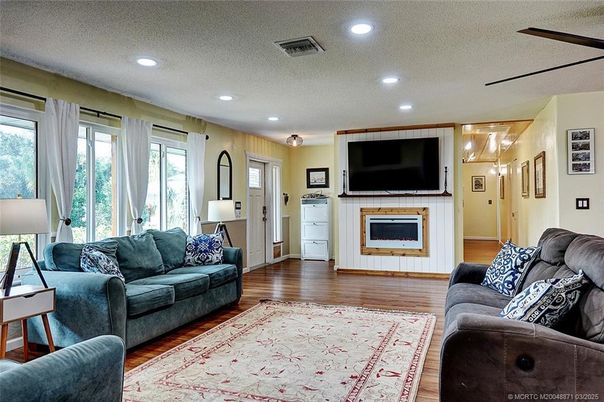 Fireplace, Interior, Living room, Recessed Lighting, Wood Texture Flooring