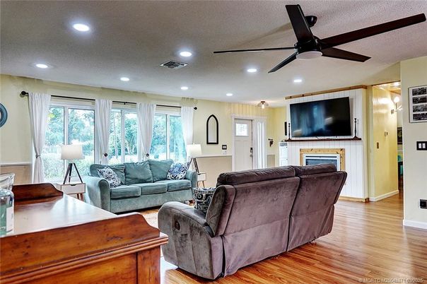 Fireplace, Interior, Living room, Recessed Lighting, Wood Texture Flooring
