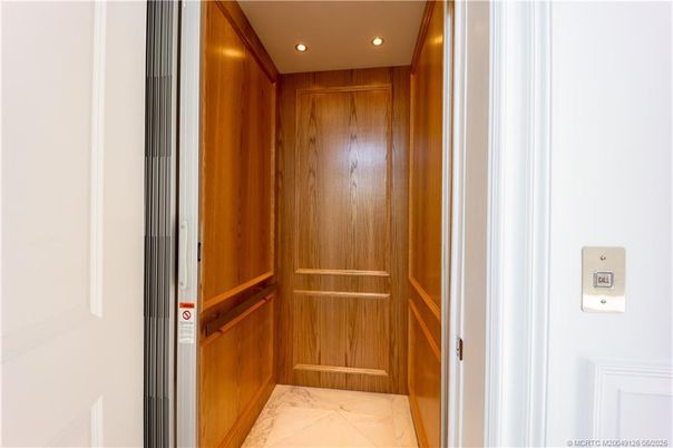 Elevator, Interior, Marble, Recessed Lighting, Wooden Walls