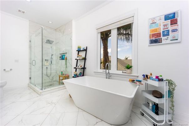 Bathroom, Free Standing Baths, Glass Shower, Interior, Marble, Marble Walls, Recessed Lighting
