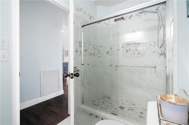 Bathroom, Glass Shower, Interior, Marble Walls, Wood Texture Flooring
