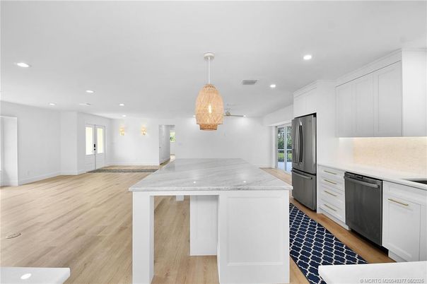 Interior, Kitchen, Pendant Lights, Recessed Lighting, Stainless Steel Appliances, Wood Texture Flooring