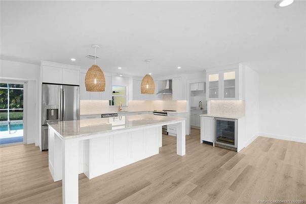 Interior, Kitchen, Pendant Lights, Recessed Lighting, Stainless Steel Appliances, Wood Texture Flooring