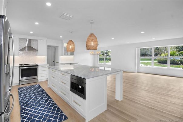 Interior, Kitchen, Pendant Lights, Recessed Lighting, Stainless Steel Appliances, Wood Texture Flooring