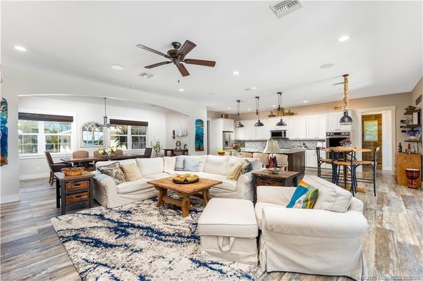 Dining room, Interior, Kitchen, Living room, Pendant Lights, Recessed Lighting, Stainless Steel Appliances, Wood Texture Flooring