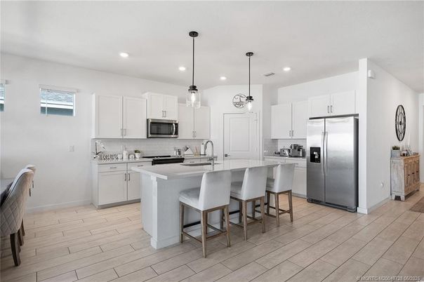 Interior, Kitchen, Pendant Lights, Recessed Lighting, Stainless Steel Appliances, Wood Texture Flooring