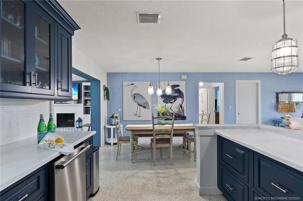 Dining room, Fireplace, Interior, Kitchen, Pendant Lights, Stainless Steel Appliances